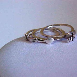 - Sterling Silver Heart In Hands Ring